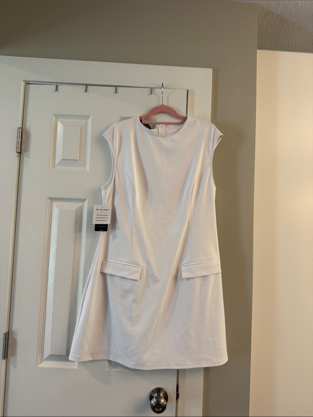 Sleeveless Mini Dress in White with Faux Flap Pockets